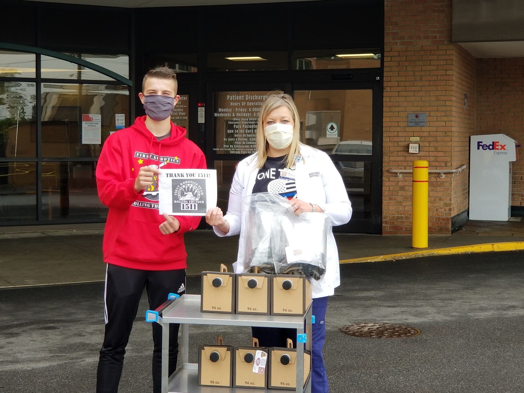 1511 Student dropping off coffee to a nurse at a hospital