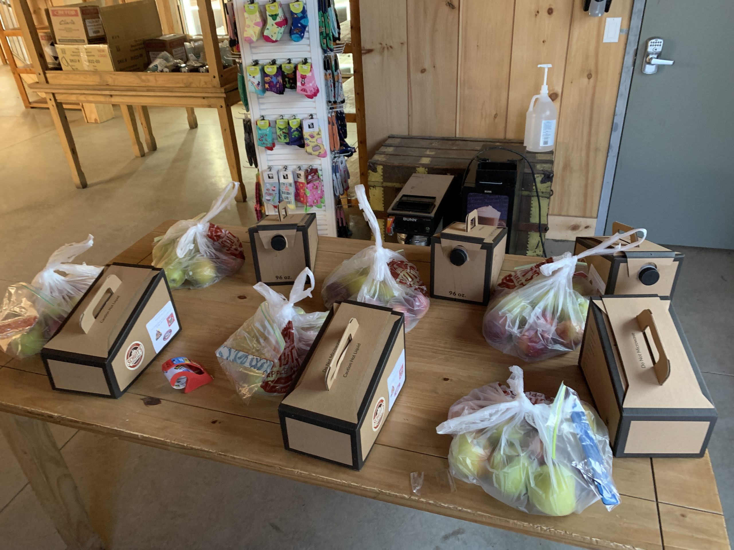 Table with coffee and apples to be donated to health care workers