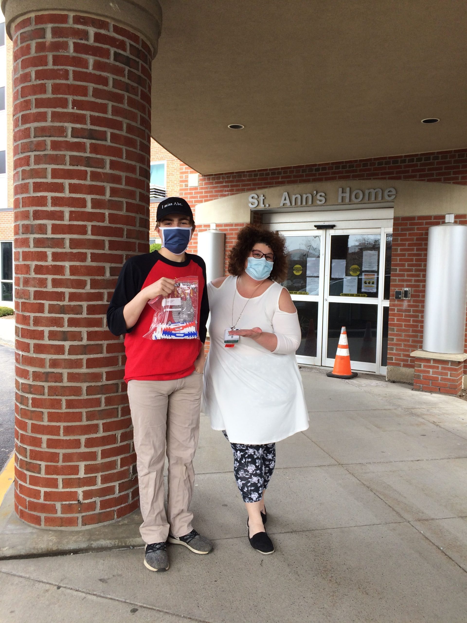 Team member dropping off surgical mask straps at St. Anne's Home
