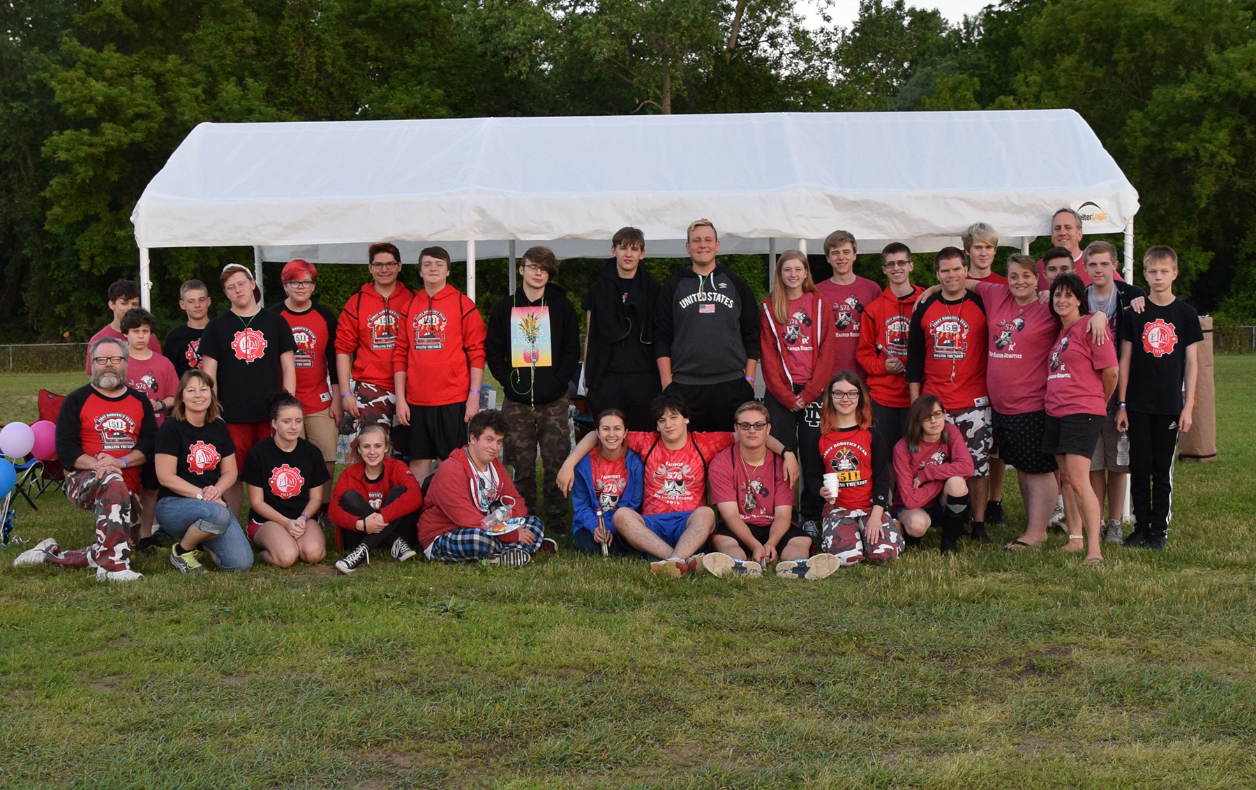 Outdoor group photo of 3 FIRST teams at Robotics Relay for a Reason