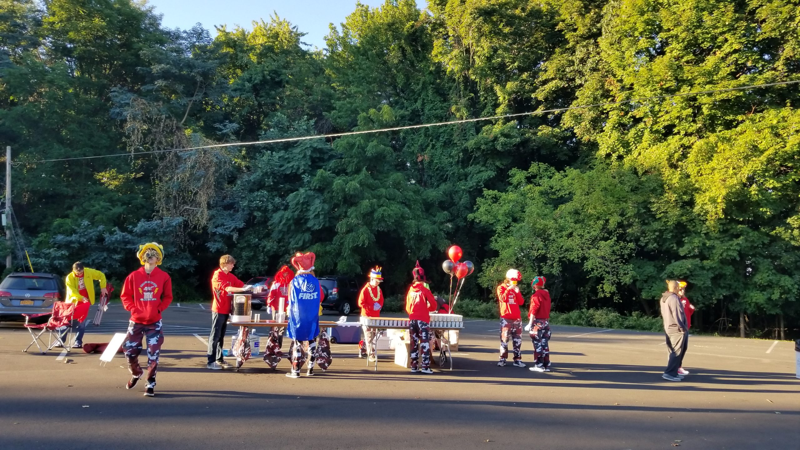 Team members at a water station table at Rochester Marathon