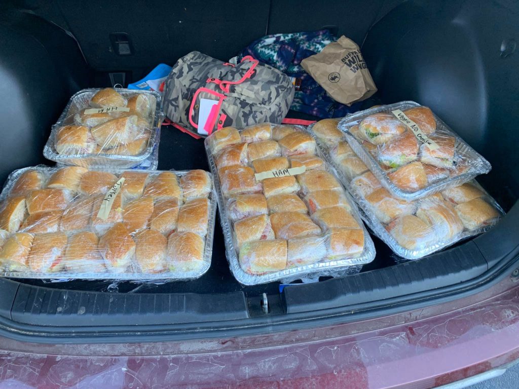 Car trunk full of sandwiches for hospital workers