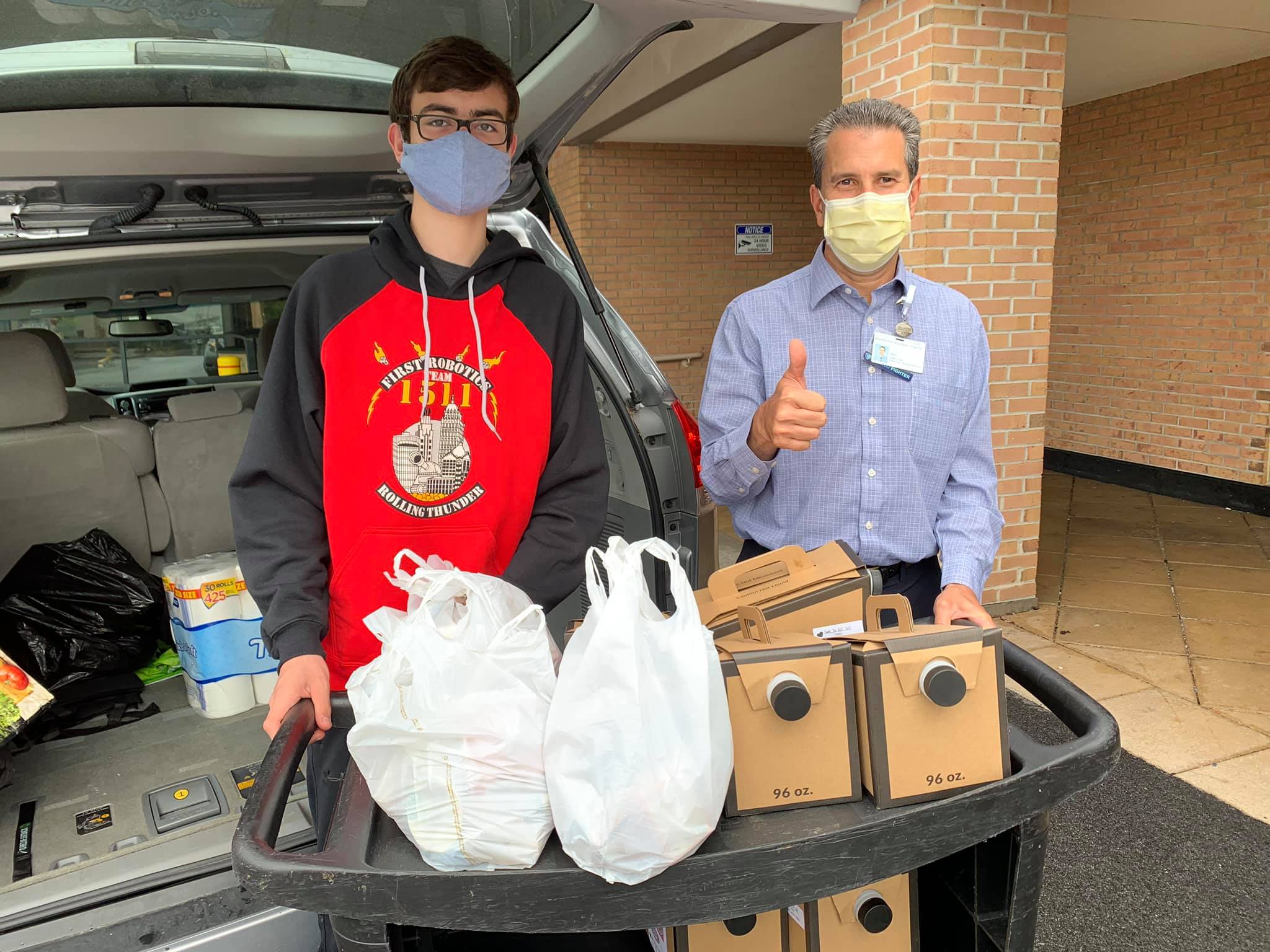 Student delivering snacks and coffee to Rochester General Hospital