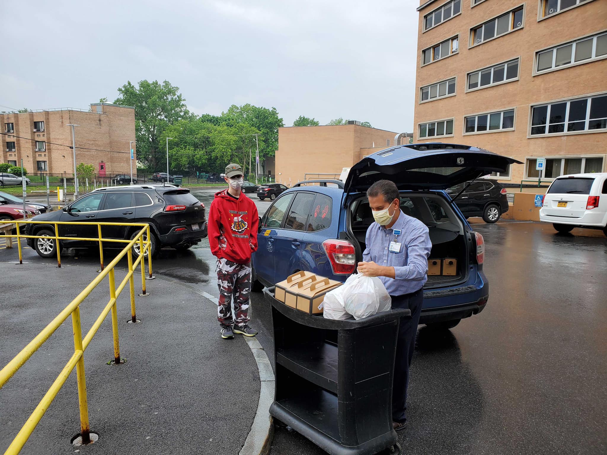Student delivering snacks and coffee to Rochester General Hospital
